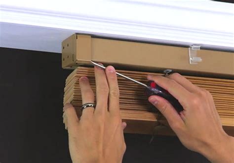 how do you remove mini blinds from metal brackets|removing pull down window shades.